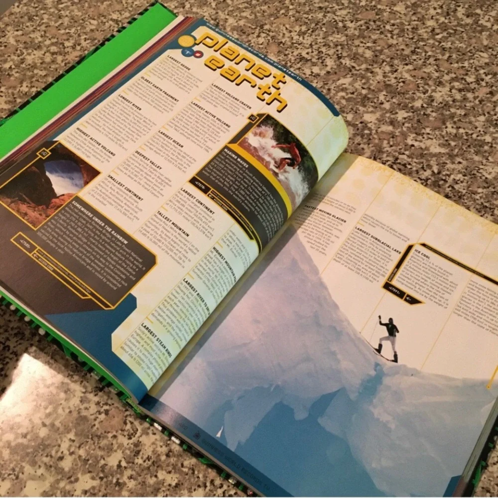 2002 book Guinness World Records hardcover photos illustrations web videos